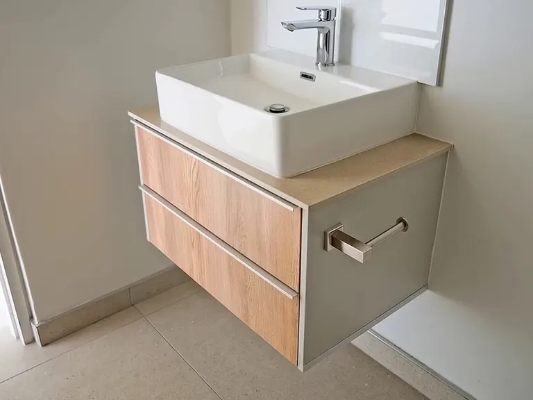 Bathroom vanity with vessel basin.