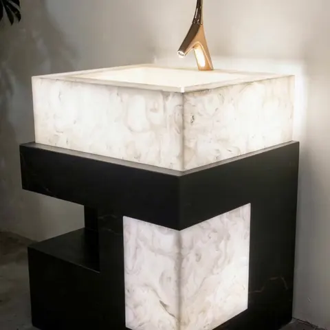 Illuminated square basin and pedestal.