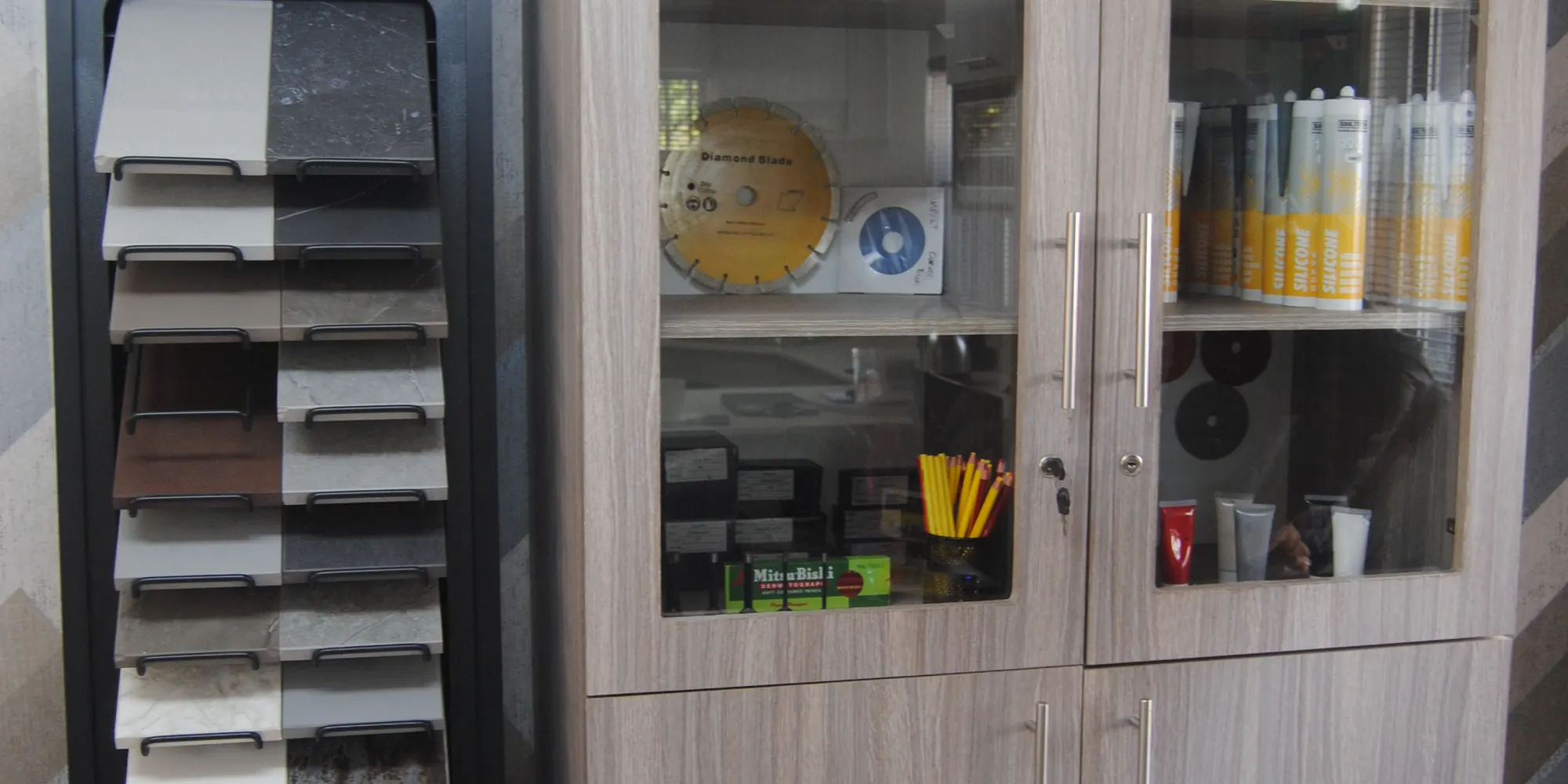 Material sample rack beside a storage cabinet.