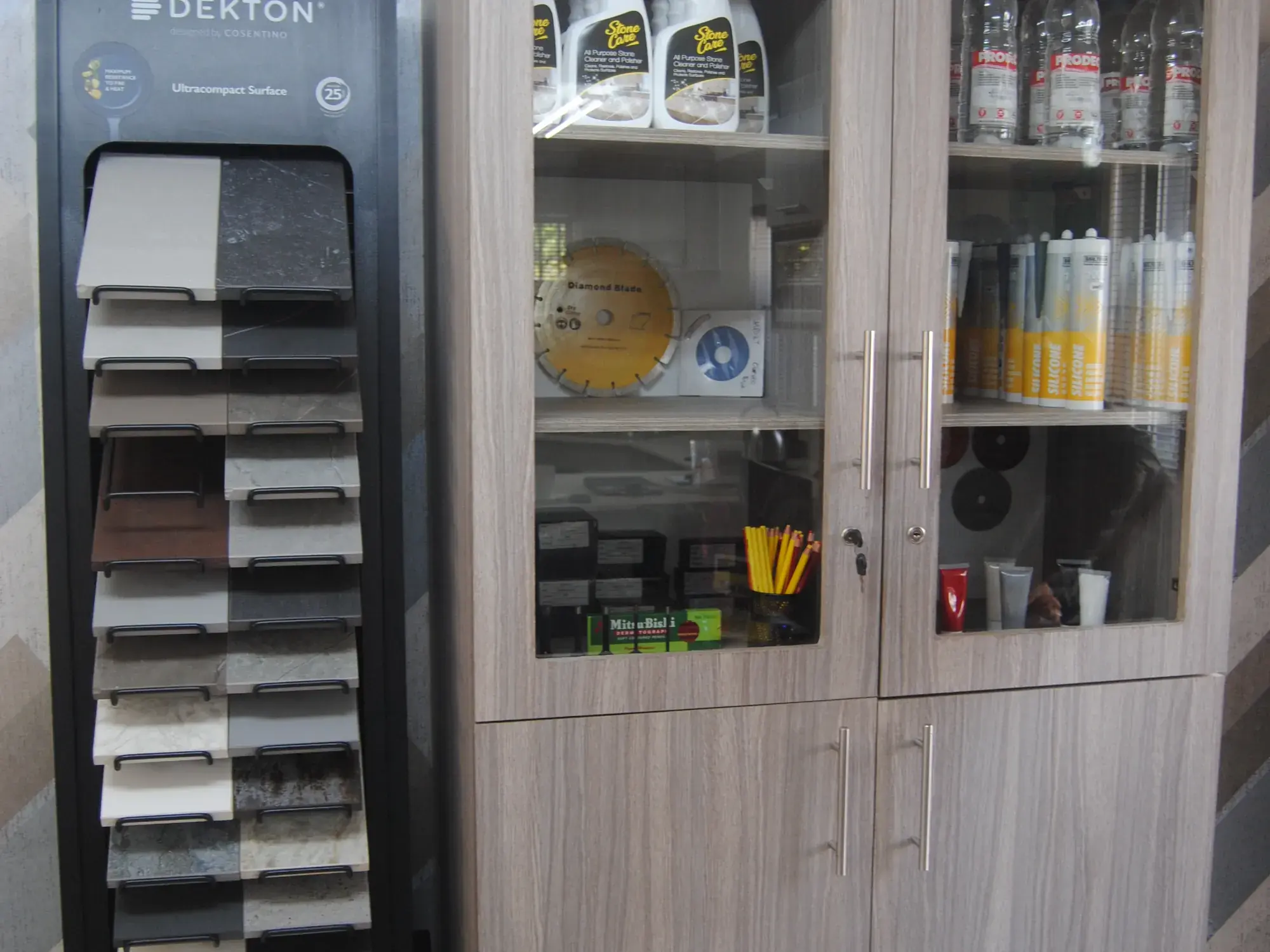 Material sample rack beside a storage cabinet.