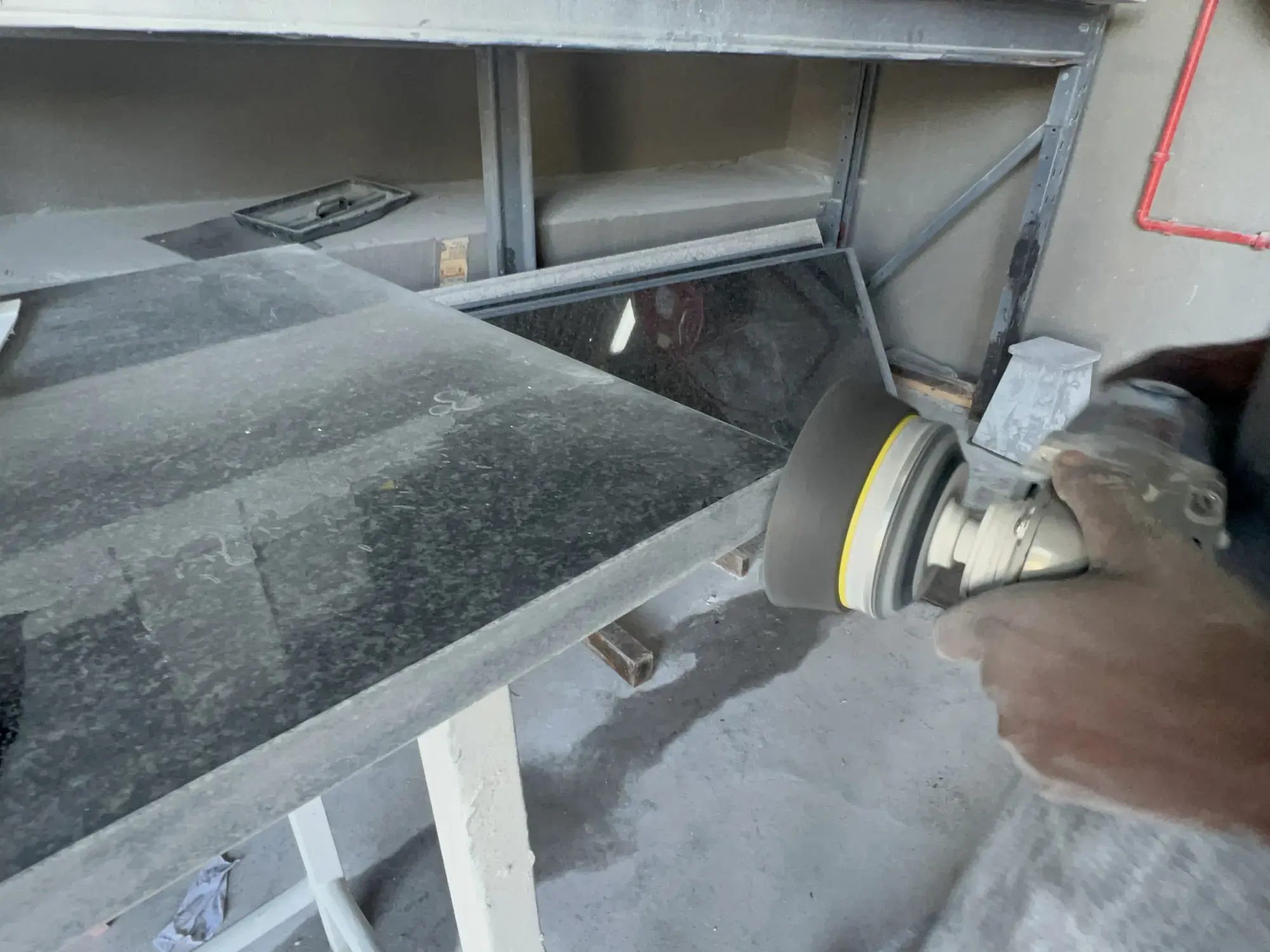 Rotary wheel finishing stone edge.