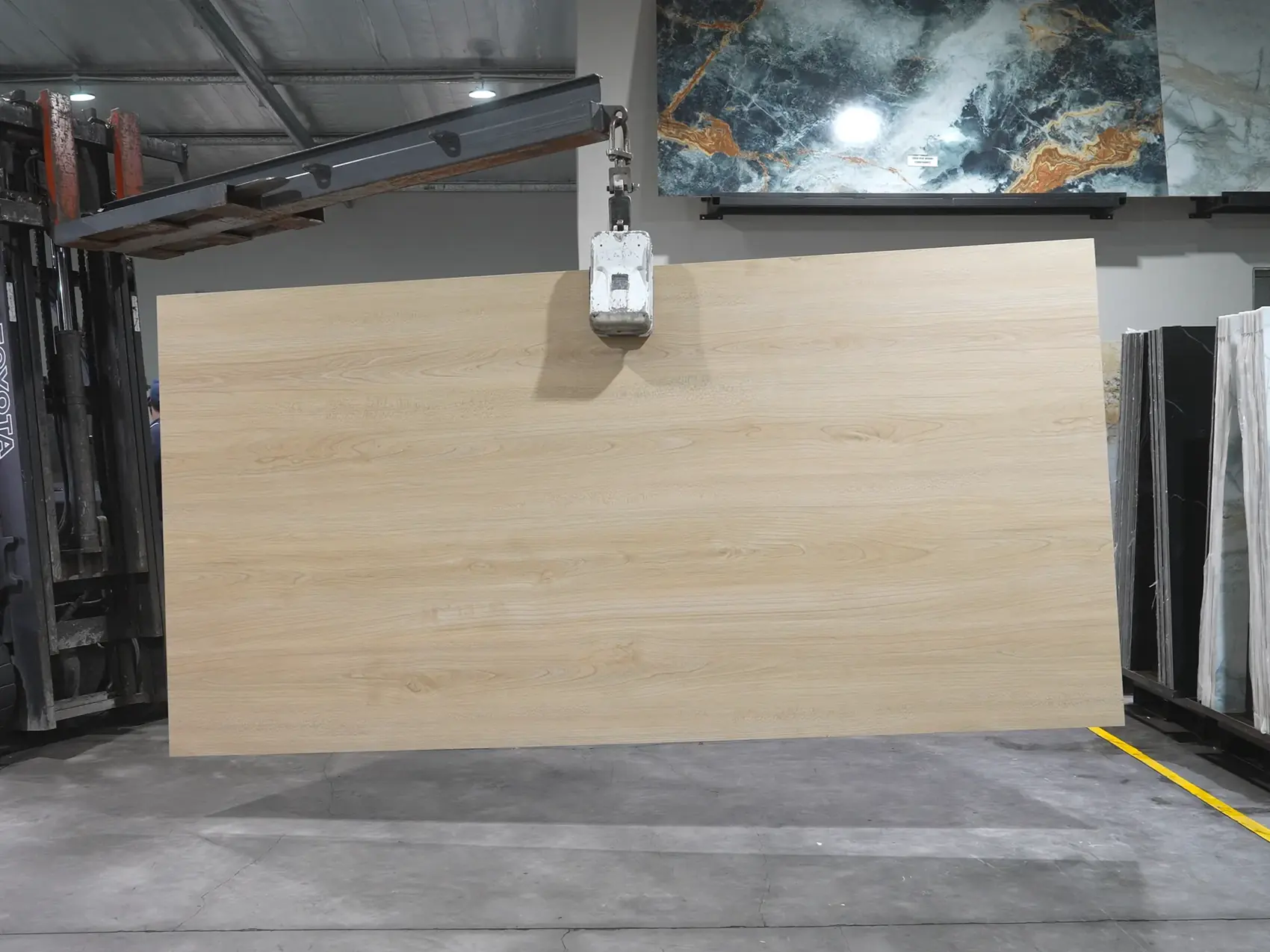 Slab being moved in workshop.