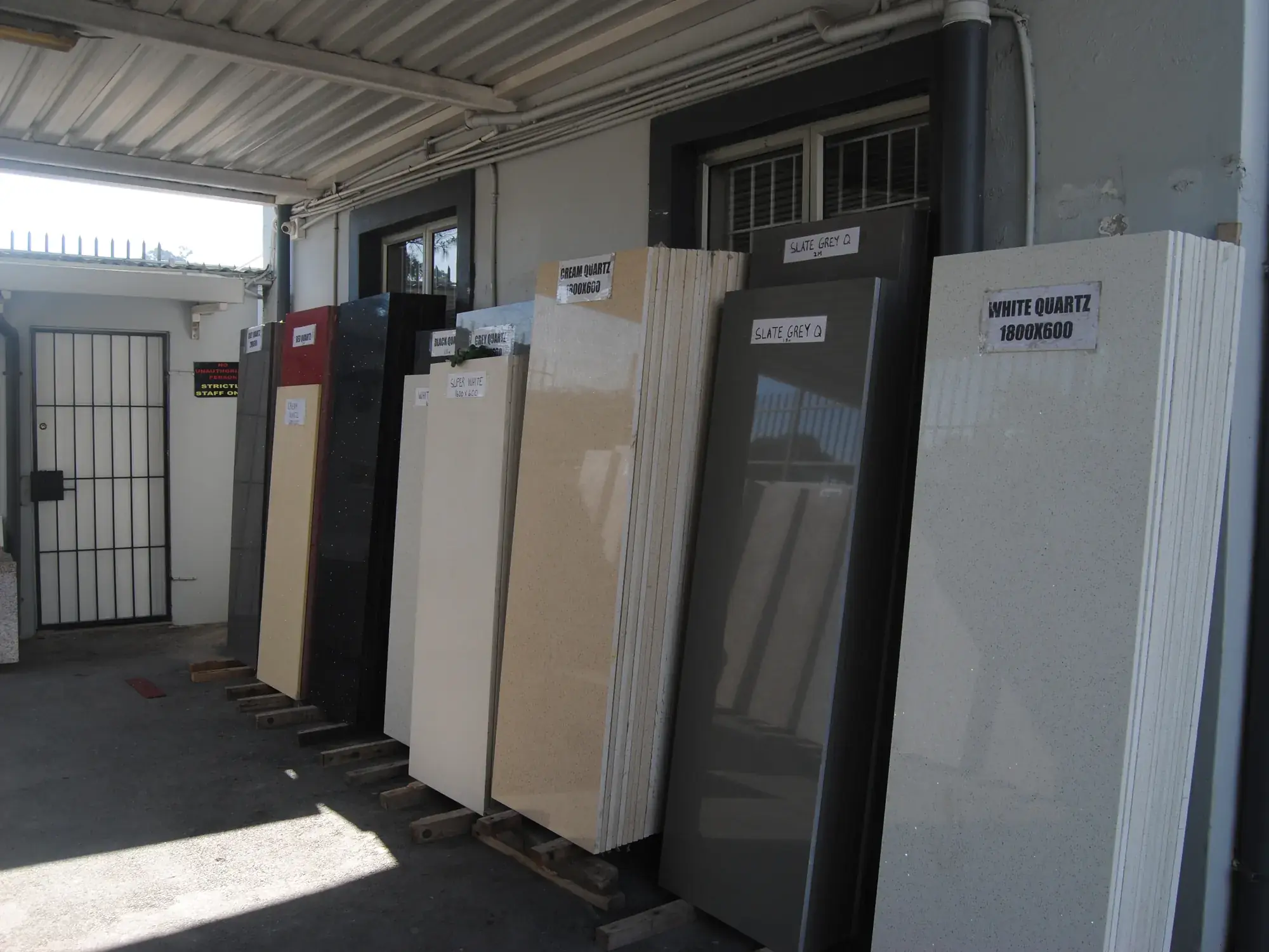Stone slabs in premises display racks.