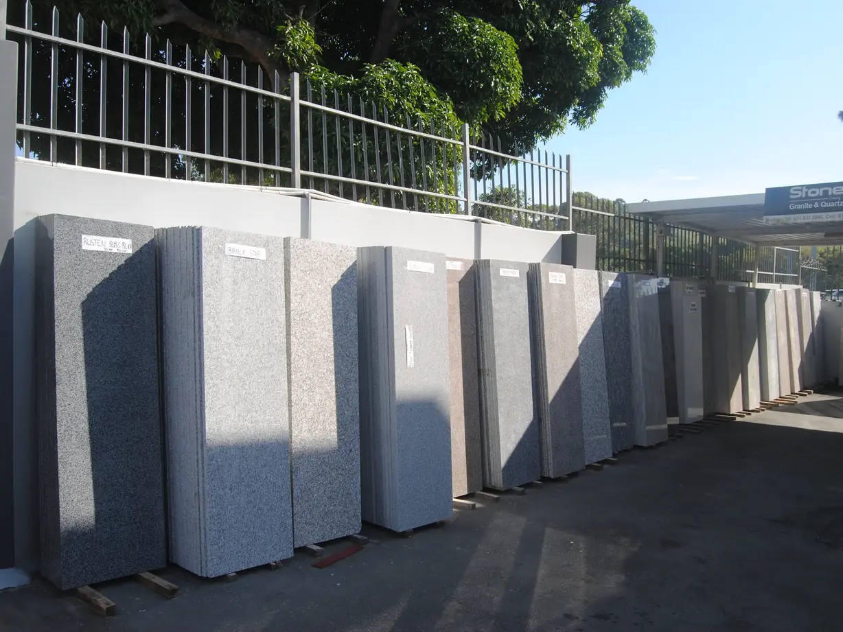 Stone slabs in yard.